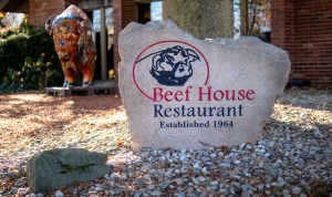 Close up of Beef House Restaurant sign.